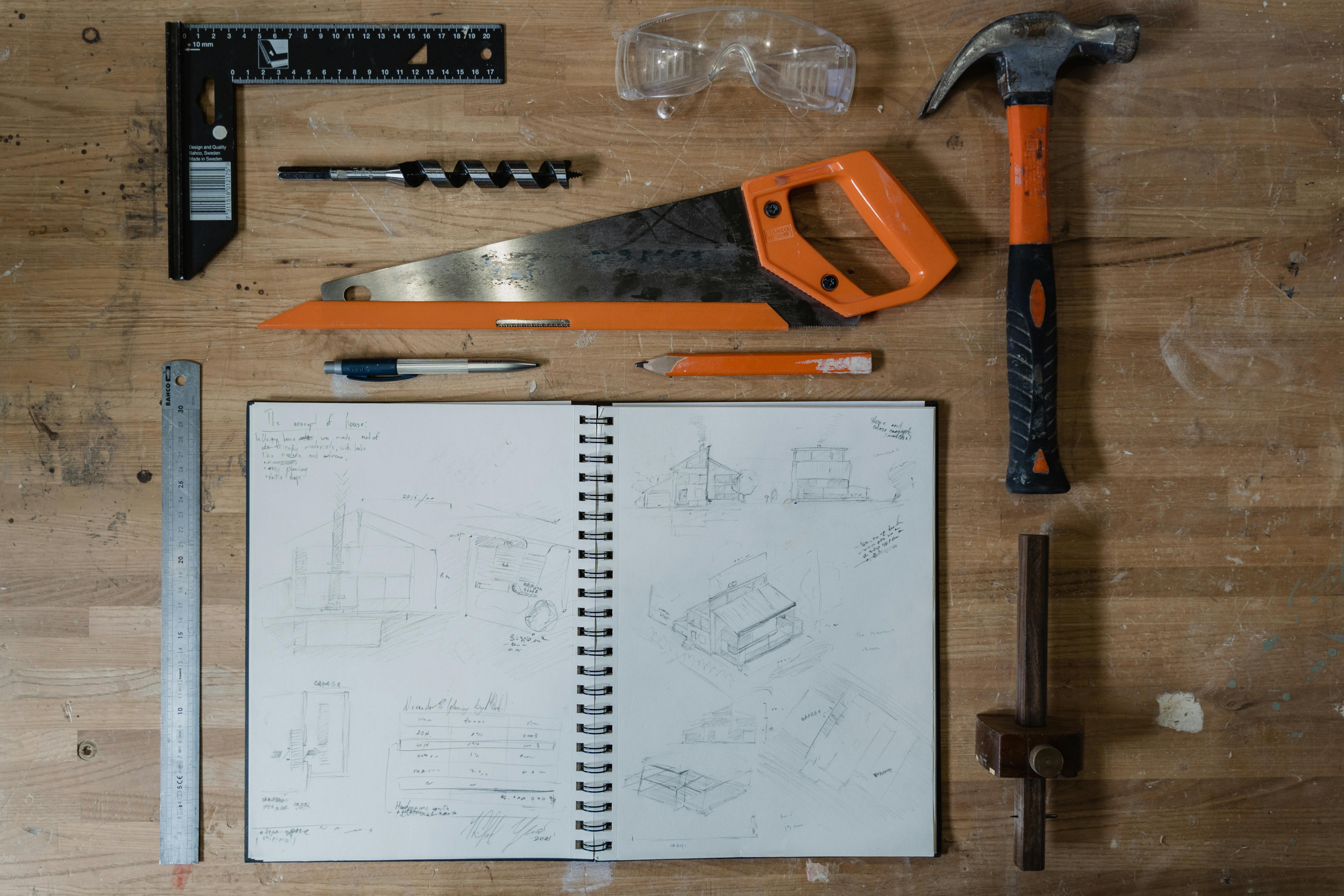 Background showing tools like hammer, ruler and a drill